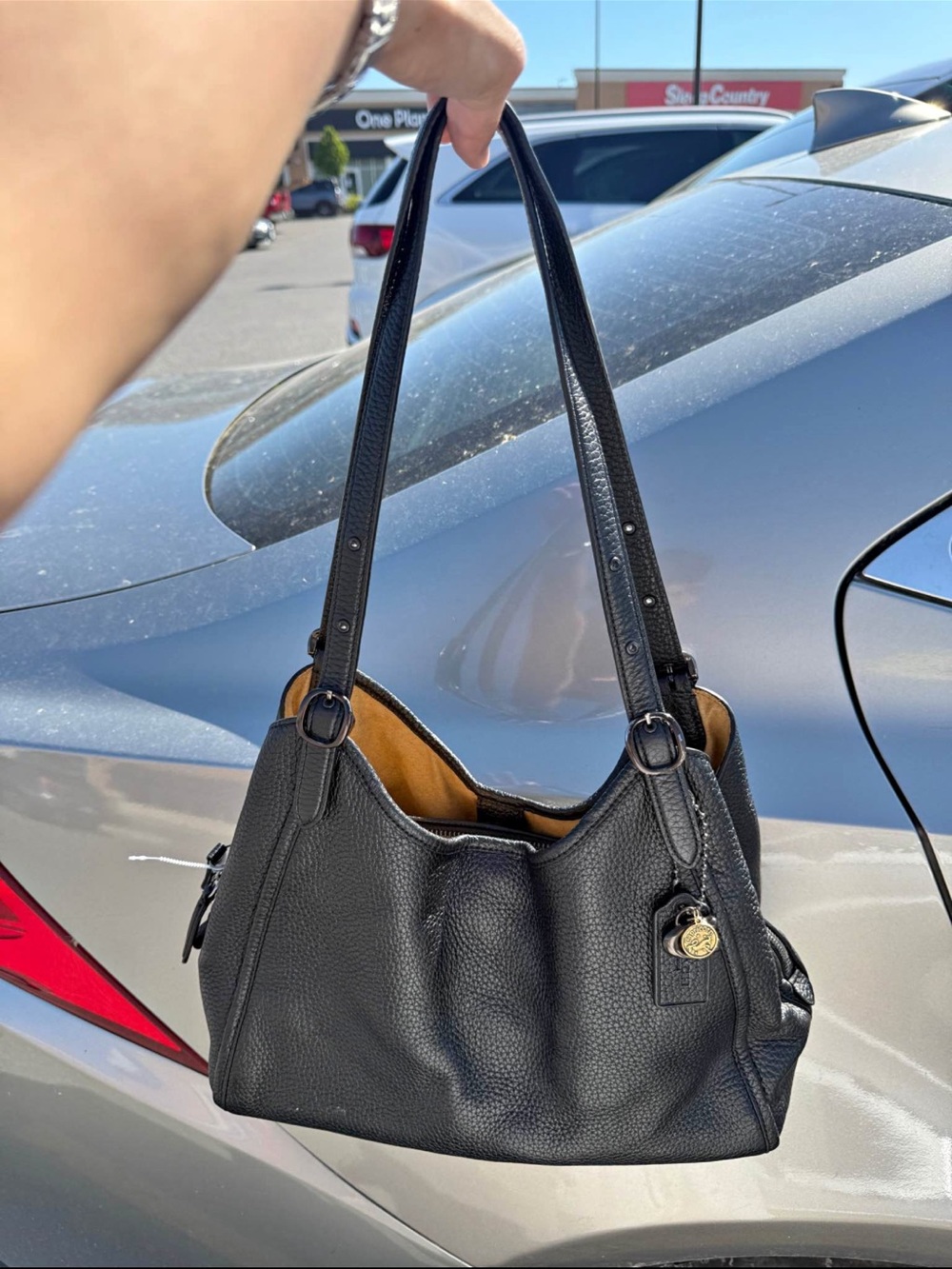 Coach Black Pebbled Leather Shoulder Bag with Gold Charm